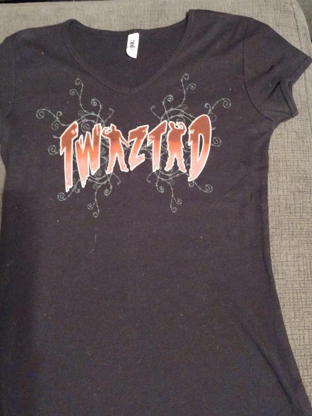 Black V‑Neck Graphic Tee with Orange Logo